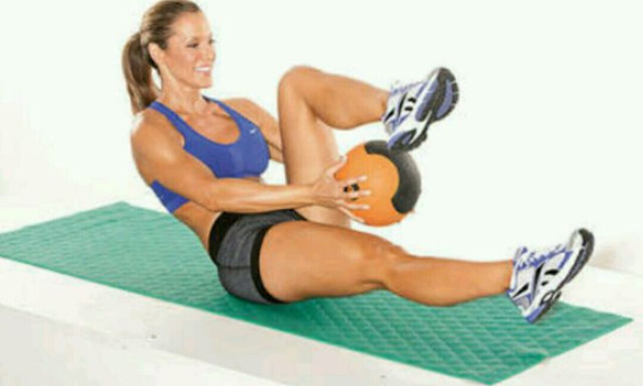 How can I work out my upper back using a stability ball at home